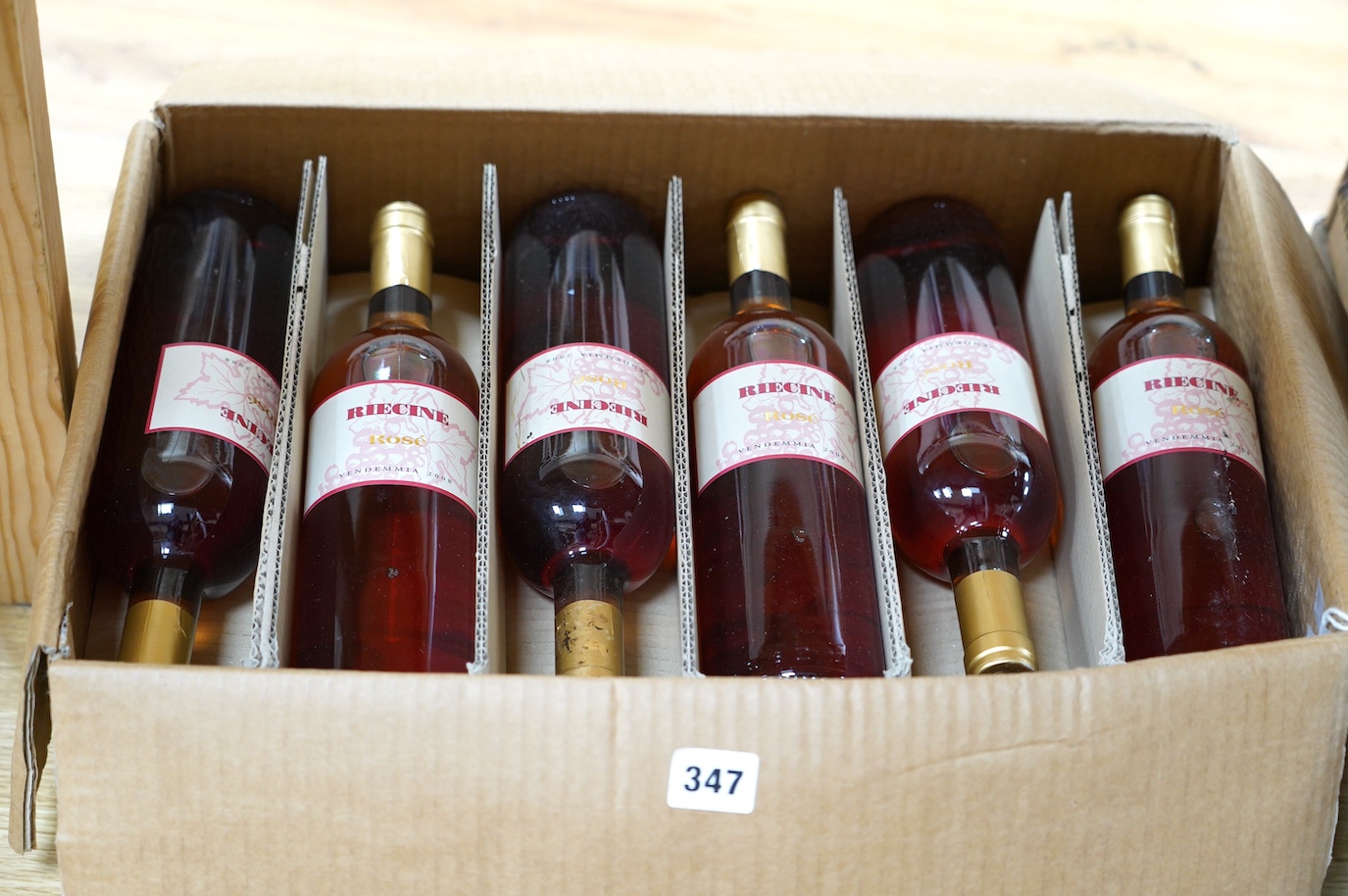 Twelve bottles of Riecine Toscana Rosé. Condition - fair, storage history unknown